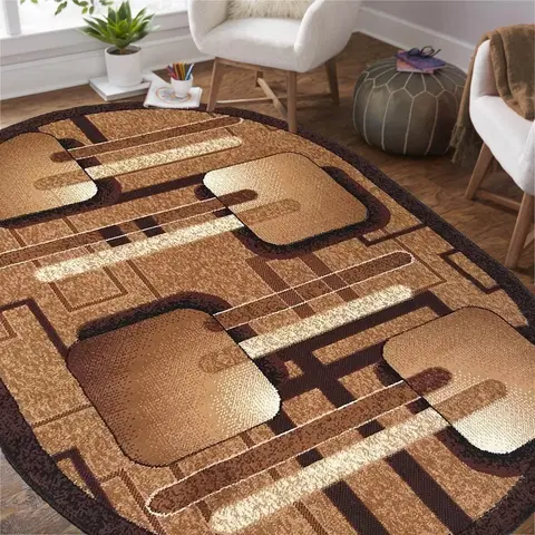 Kulaté a oválné koberce Oválný koberec v hnědé barvě s geometrickými vzory