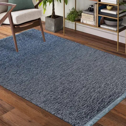 Moderní koberce Kvalitní modrý koberec do obývacího pokoje