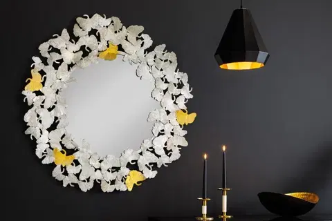 Luxusní a designová zrcadla Estila Designové glamour nástěnné zrcadlo Ginko s ozdobným kovovým rámem z listů ginka stříbrné barvy 95cm