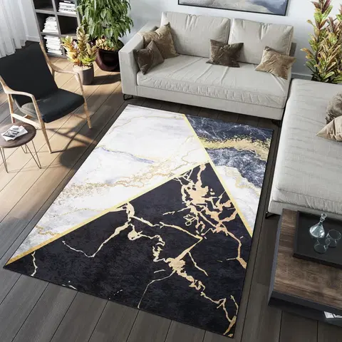 Moderní koberce Výrazný tmavý trendový koberec s protiskluzovou úpravou
