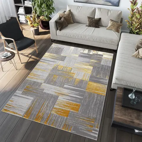 Moderní koberce Moderní šedý koberec do obývacího pokoje se zlatým motivem
