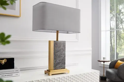 Designové a luxusní noční lampy do ložnice Estila Stolní lampa Miracul v glamour stylu s podstavou z mramoru šedé barvy a kovu ve zlaté barvě 65 cm