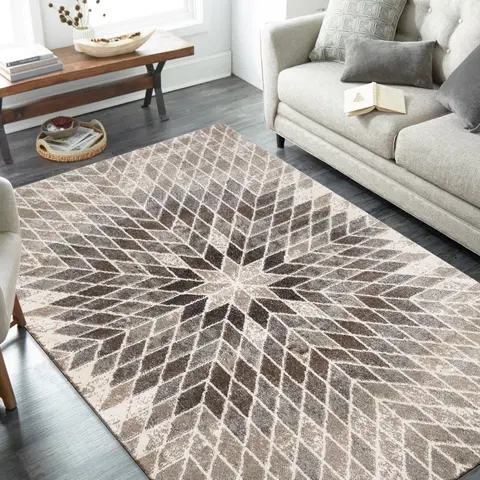 Moderní koberce Moderní designový béžový koberec s přírodními motivy