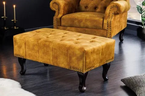 Stylové a luxusní taburety Estila Designová taburetka Cella s Chesterfield sametovým čalouněním s dřevěnými nožičkami hořčicově žlutá 80cm