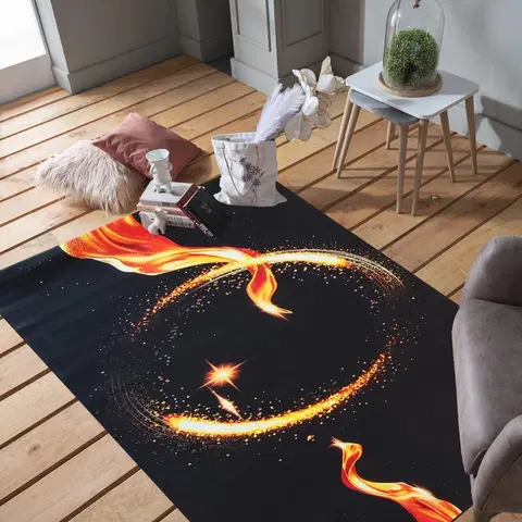Moderní koberce Čierny koberec s ohnivým kruhom
