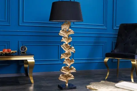 Designové a luxusní stojící lampy Estila Art deco stojací lampa Ginka z kovu ve zlaté barvě s černým textilním stínítkem 122cm