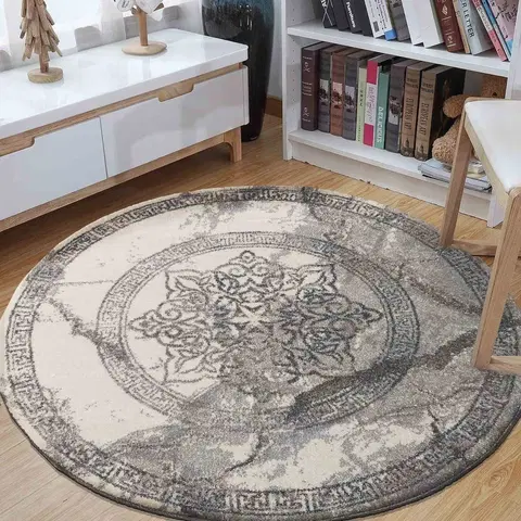 Kulaté a oválné koberce Stylový šedý kulatý koberec se vzorem mandaly