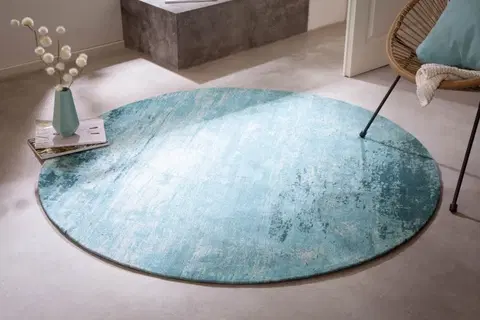 Designové a luxusní koberce Estila Retro designový kruhový koberec Adassil tyrkysové barvy 150cm