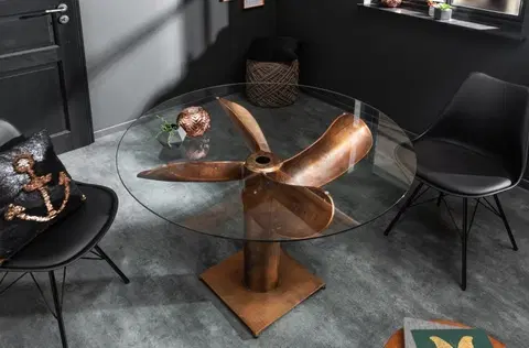 Designové a luxusní jídelní stoly Estila Industriální bronzový jídelní stůl Helic ve tvaru lodního šroubu s kulatou deskou ze skla 94cm