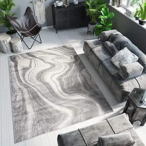 Moderní koberce Světle šedý designový koberec s abstraktním vzorem